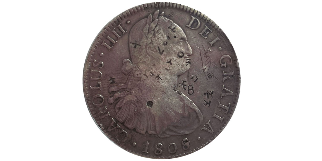 Ocho reales de Carlos IV de 1808 con resellos chinos