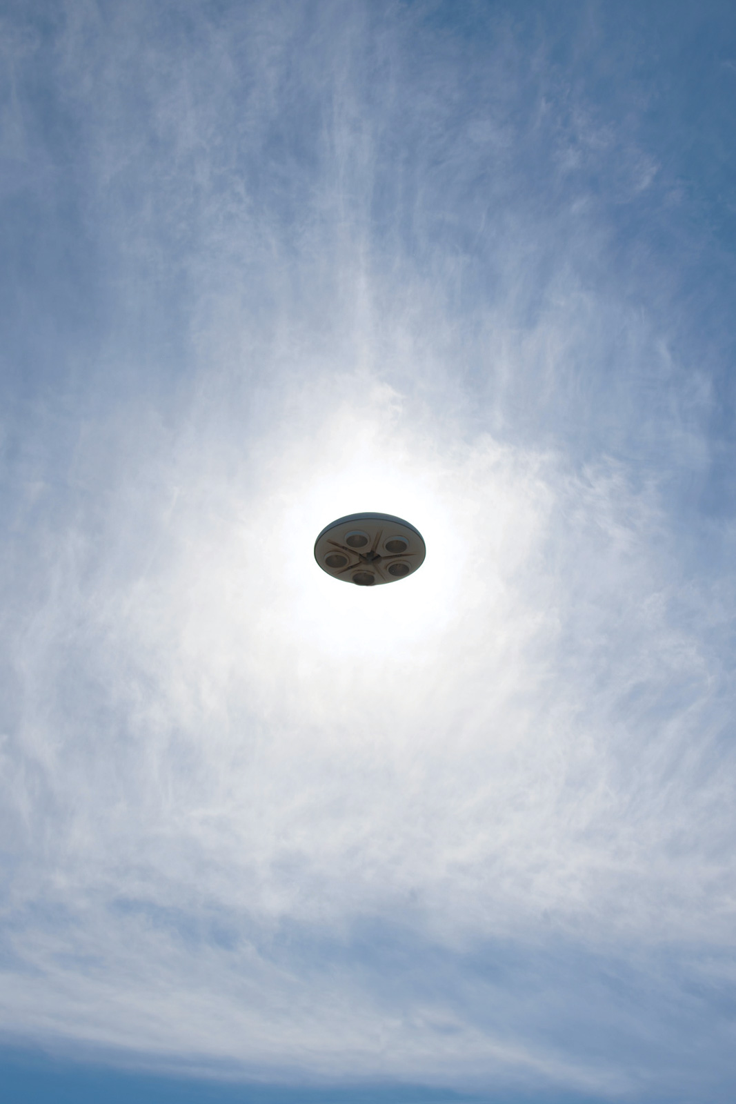 *Flying* *UFO* *in the Blue Sky*, Gianluca Carenza, 2022. Unsplash 